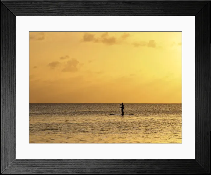 Framed Print : Stand up paddle along Seven Mile Beach at sunset, George Town, Grand Cayman Framed Print : Stand up paddle along Seven Mile Beach at sunset, George Town, Grand Cayman