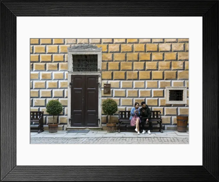 Framed Print : Tourists sitting on a bench at premises of Cesky Krumlov Castle and Chateau, Cesky Krumlov, South Bohemian Region, Czech Republic Framed Print : Tourists sitting on a bench at premises of Cesky Krumlov Castle and Chateau, Cesky Krumlov, South Bohemian Region, Czech Republic