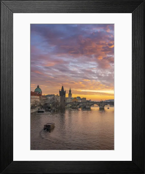 Framed Print : Boat going towards Charles Bridge and Church of Saint Francis of Assisi with Old Town