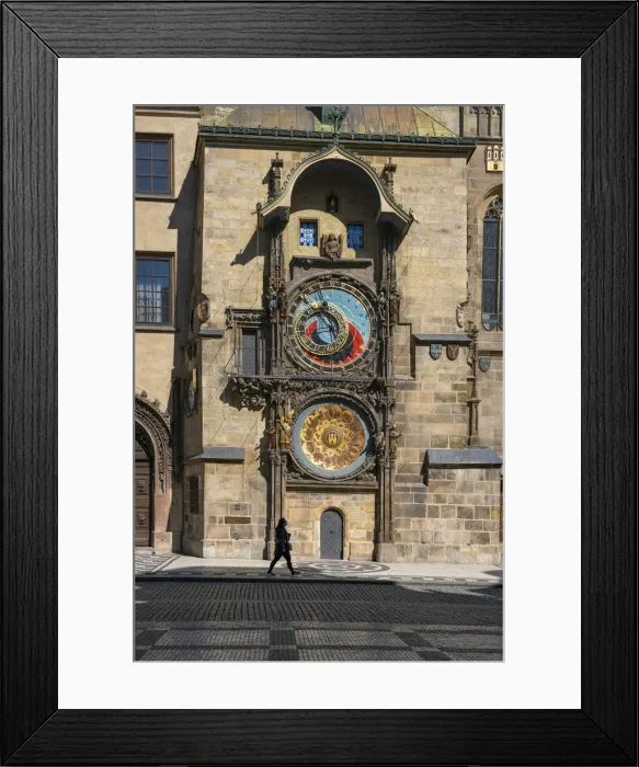 Framed Print : Woman walking by Prague Astronomical Clock at Old Town Square, Prague, Bohemia Framed Print : Woman walking by Prague Astronomical Clock at Old Town Square, Prague, Bohemia