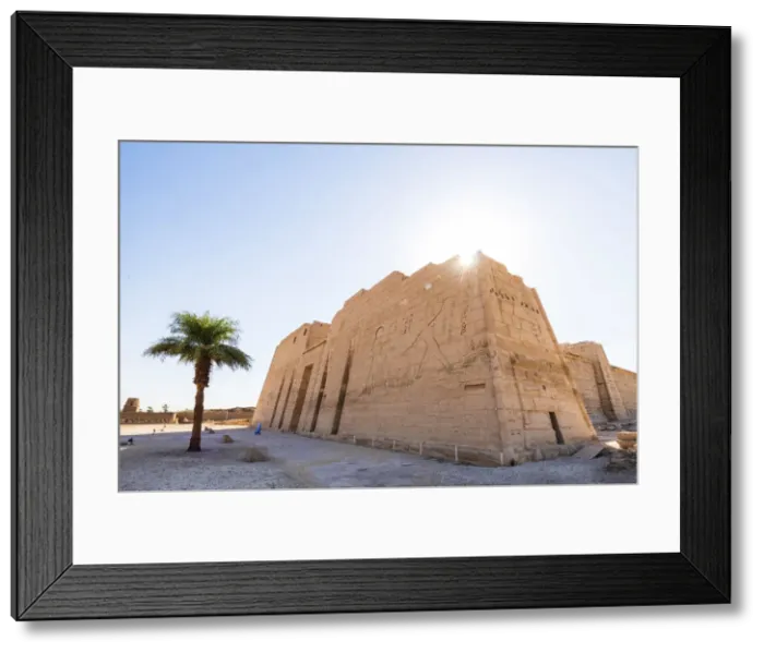 Framed Print : Temple guardian at the temple of Ramses III on the West bank of the Nile at Luxor, Egypt