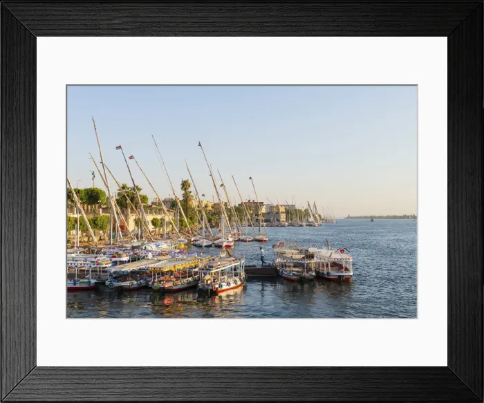 Framed Print : Boats on the river Nile in Luxor, Egypt, Africa Framed Print : Boats on the river Nile in Luxor, Egypt, Africa