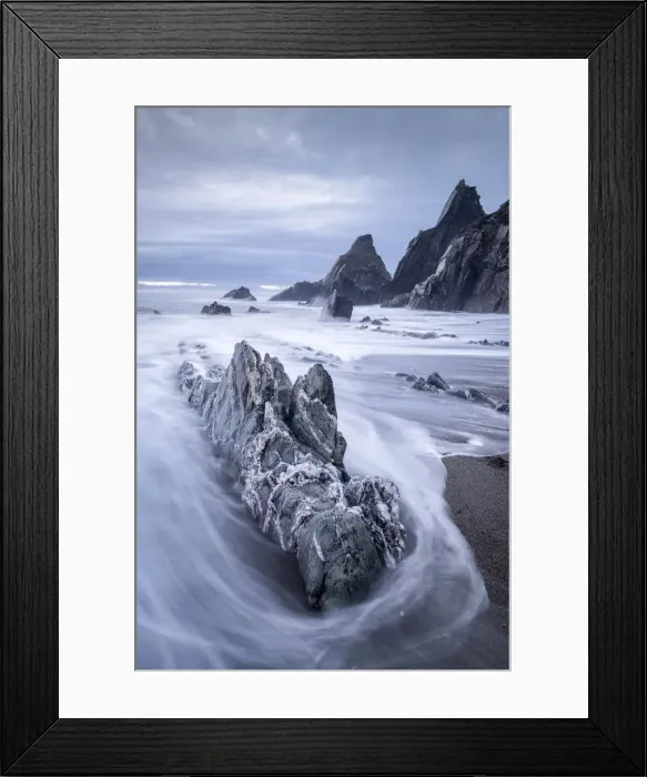 Framed Print : Waves sweep onto the rocky beach on a stormy evening at Westcombe Bay, Devon, England Framed Print : Waves sweep onto the rocky beach on a stormy evening at Westcombe Bay, Devon, England
