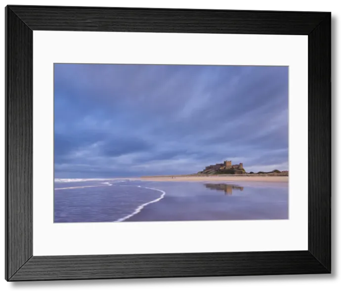 Framed Print : Stormy sky above Bamburgh Castle in Northumberland, England. Spring Framed Print : Stormy sky above Bamburgh Castle in Northumberland, England. Spring