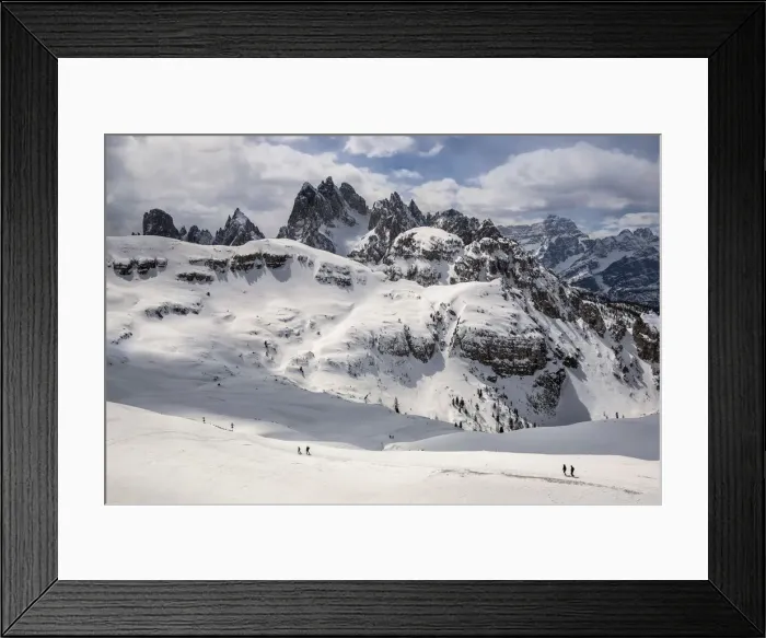Framed Print : Hikers along the path to Auronzo Refuge, in the background the mountain group of Cadini Framed Print : Hikers along the path to Auronzo Refuge, in the background the mountain group of Cadini