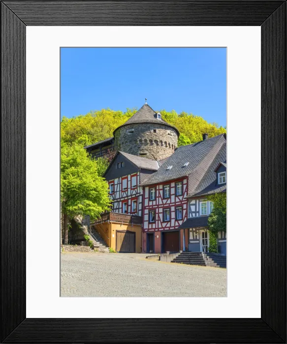 Framed Print : Half-timbered houses with Schinderhannes tower at Herrstein, Hunsruck, Rhineland-Palatinate, Germany Framed Print : Half-timbered houses with Schinderhannes tower at Herrstein, Hunsruck, Rhineland-Palatinate, Germany