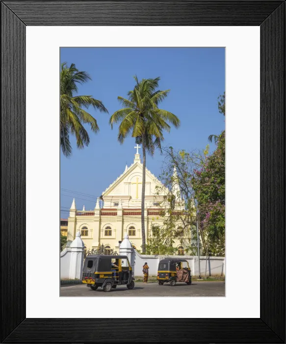 Framed Print : India, Kerala, Cochin - Kochi, Fort Kochi, Auto rickshaws passing infront of the Santa