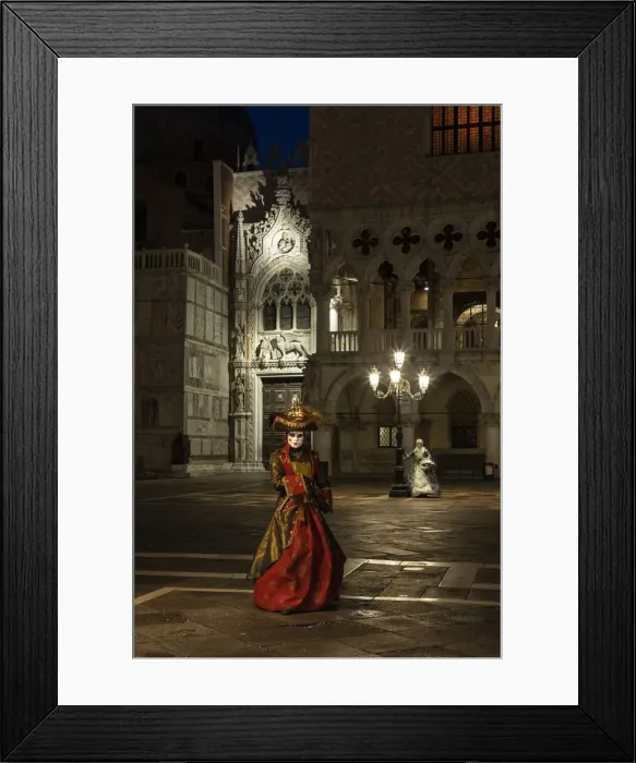 Framed Print : A woman in costume poses in St. Marks square during the Venice Carnival, Venice