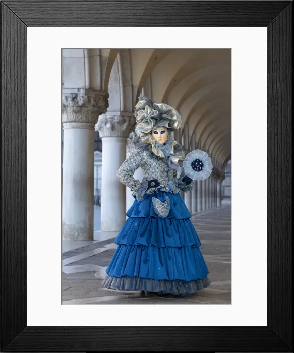 Framed Print : A woman poses under the colonnades in St. Marks Square during the Venice Carnival