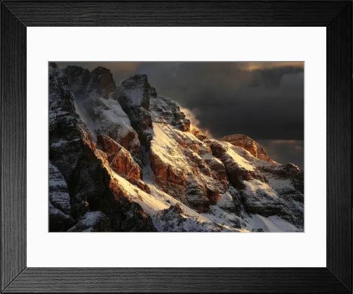 Framed Print : Snowy peaks of the Dolomites during a fiery sunrise from the Giau Pass, Dolomites, Italy