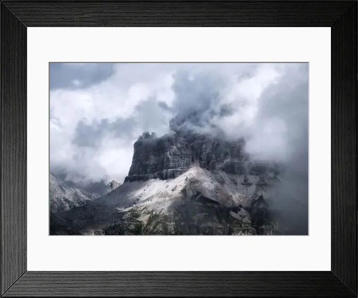 Framed Print : Rugged peaks partly covered in clouds, Dolomites, Italy