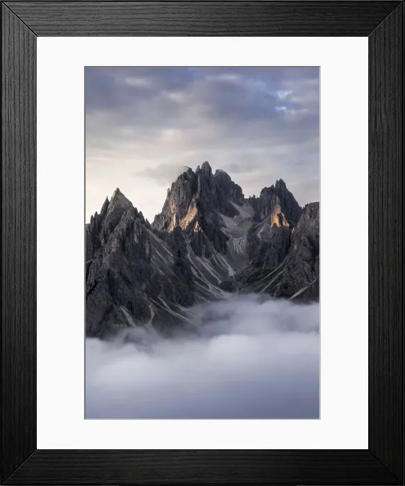 Framed Print : Low fog partially covering the Cadini di Misurina at sunrise in the Dolomites, Italy Framed Print : Low fog partially covering the Cadini di Misurina at sunrise in the Dolomites, Italy