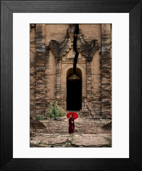 Framed Print : Novice monk standing in front of the unfinished Pahtodawgyi pagoda known for a crack Framed Print : Novice monk standing in front of the unfinished Pahtodawgyi pagoda known for a crack