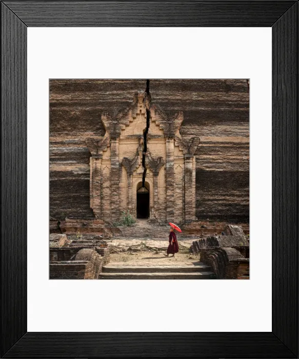 Framed Print : Novice monk walking towards unfinished Pahtodawgyi pagoda known for a crack caused by a Framed Print : Novice monk walking towards unfinished Pahtodawgyi pagoda known for a crack caused by a