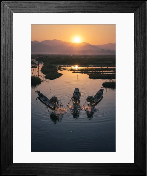 Framed Print : Three fishermen catching fish from boats using traditional conical nets at sunrise