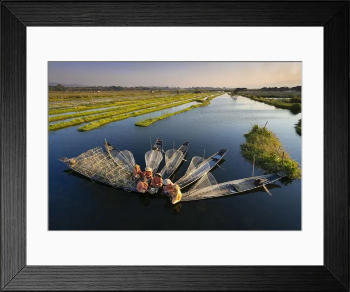 Framed Print : Elevated view of traditional fishermen on Lake Inle having a supper on boats together