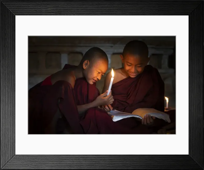 Framed Print : Two novice monks reading a book inside a temple in candle light, UNESCO, Bagan Framed Print : Two novice monks reading a book inside a temple in candle light, UNESCO, Bagan