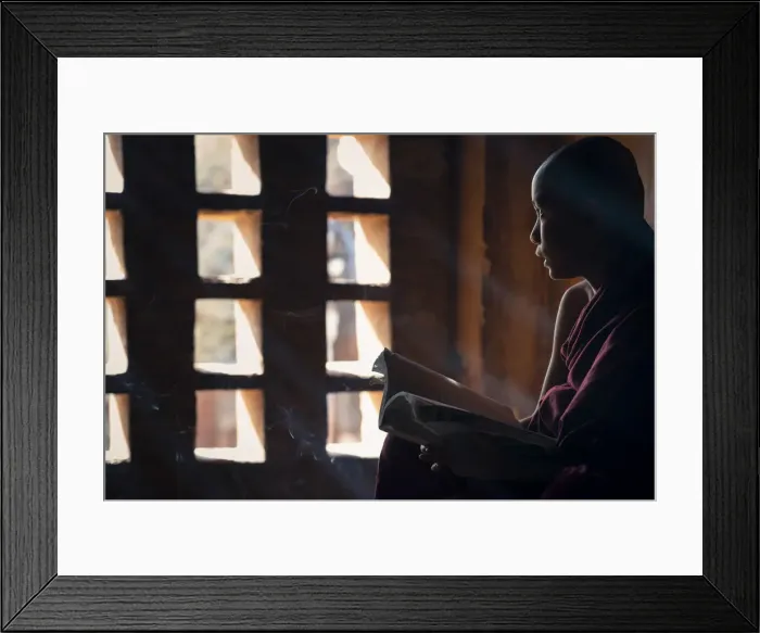 Framed Print : A young monk looking out of a window while studying inside a temple, UNESCO, Bagan Framed Print : A young monk looking out of a window while studying inside a temple, UNESCO, Bagan