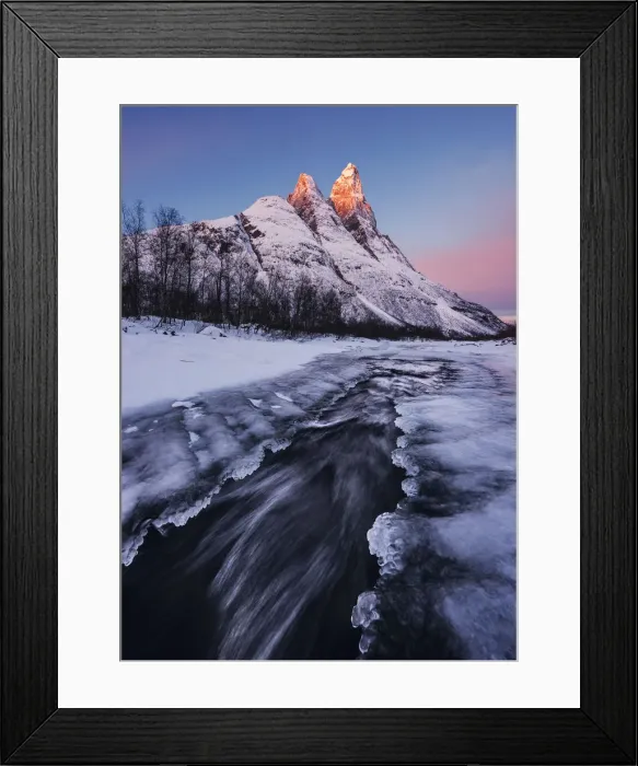 Framed Print : Frozen river and Mt. Otertinden taking the first lights of the day, Tromso region, Norway