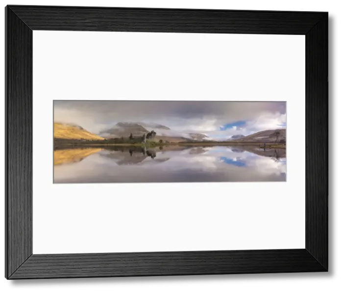 Framed Print : The ruins of Kilchurn Castle reflected in Loch Awe at dawn on a misty morning in Framed Print : The ruins of Kilchurn Castle reflected in Loch Awe at dawn on a misty morning in