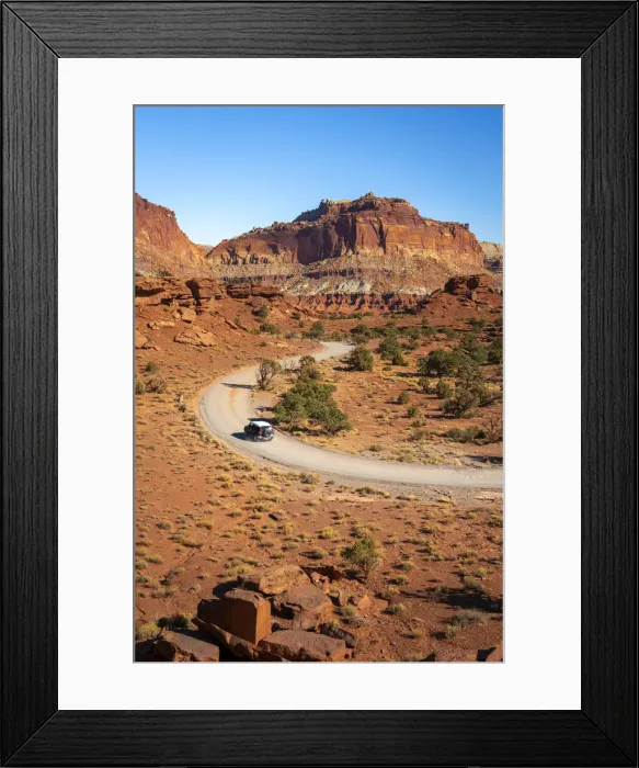 Framed Print : Car driving on dirt road and Whiskey Flat seen from Panorama Point Framed Print : Car driving on dirt road and Whiskey Flat seen from Panorama Point
