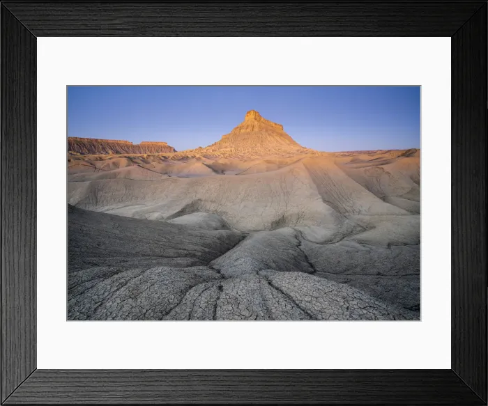 Framed Print : Factory Butte mountain rising above badlands at dawn, Wayne County, Utah Framed Print : Factory Butte mountain rising above badlands at dawn, Wayne County, Utah