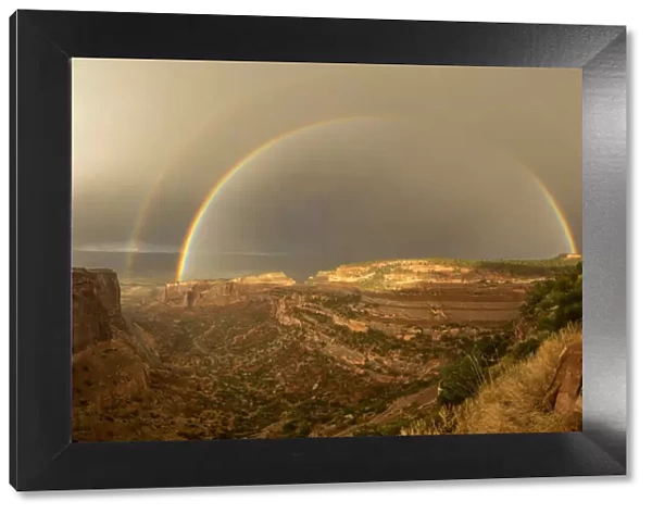 USA, Colorado, Mesa County, Colorado National Monument, rainbow over the park road