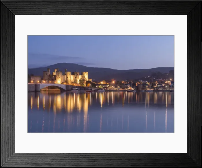 Framed Print : Majestic ruins of Conwy Castle in evening light, Snowdonia National Park, Wales, UK