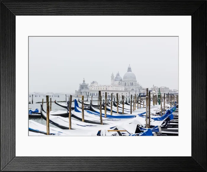 Framed Print : Winter snowfall in the city of Venice, gondolas covered by snow Framed Print : Winter snowfall in the city of Venice, gondolas covered by snow