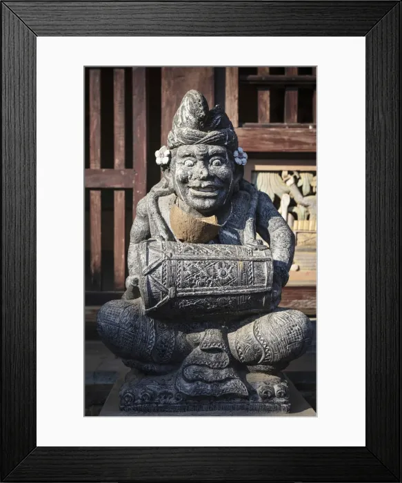 Framed Print : Indonesia, Bali, Tenganan Dau village. A stone statue of a spirit Framed Print : Indonesia, Bali, Tenganan Dau village. A stone statue of a spirit