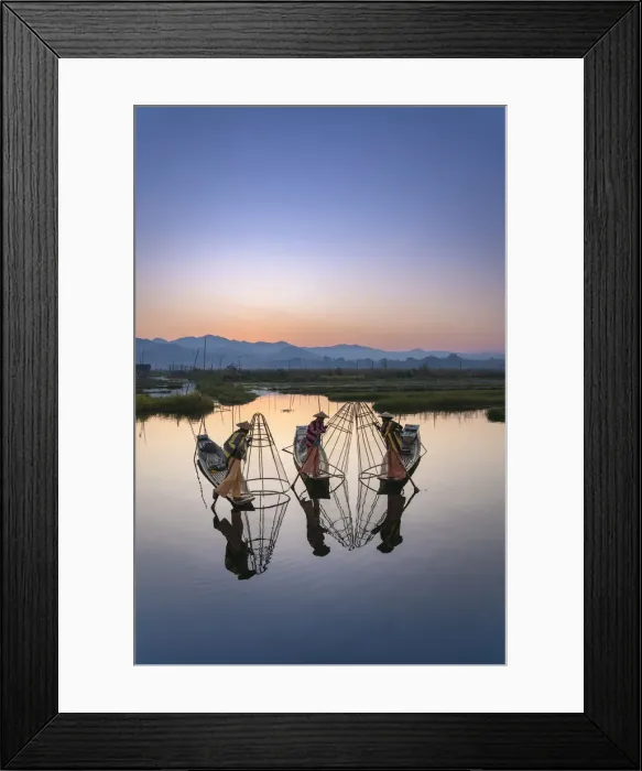 Framed Print : Three fishermen holding typical conical nets on their boats before sunrise Framed Print : Three fishermen holding typical conical nets on their boats before sunrise
