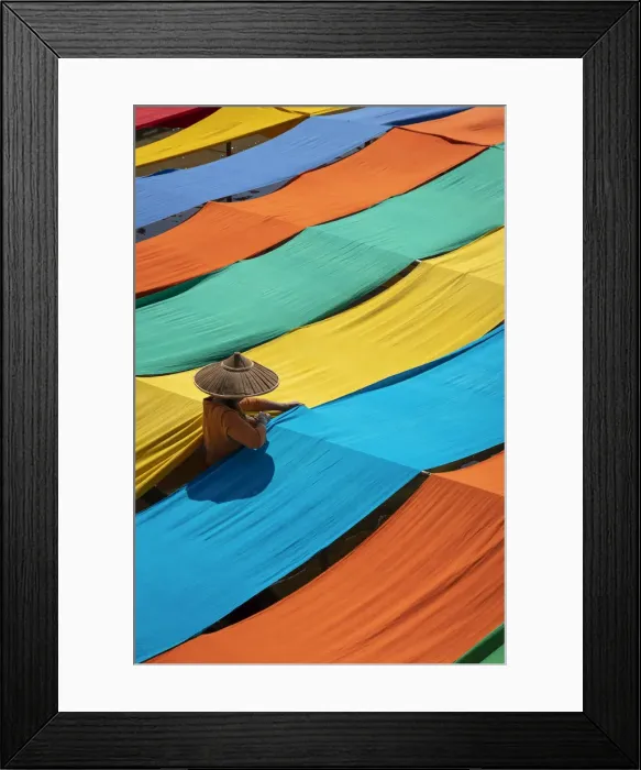 Framed Print : Elevated view of woman hanging long pieces of dyed fabric to dry, Lake Inle