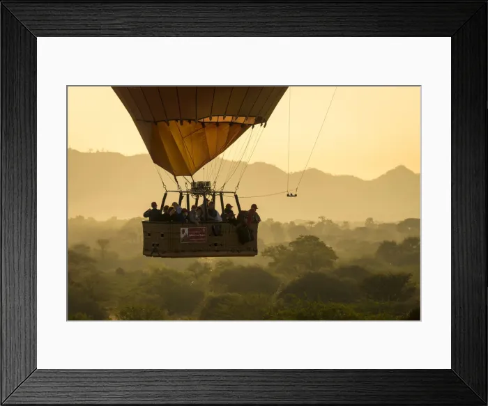Framed Print : Tourists in a hot air balloon basket flying over vegetation, UNESCO, Bagan, Myanmar Framed Print : Tourists in a hot air balloon basket flying over vegetation, UNESCO, Bagan, Myanmar