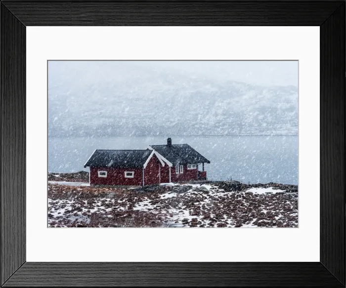 Framed Print : Two cabins along a fjord during a snowfall in the Lofoten islands, Norway Framed Print : Two cabins along a fjord during a snowfall in the Lofoten islands, Norway