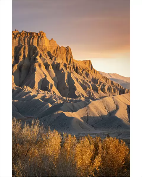 Badlands at South Caineville Mesa at sunset, Caineville, Utah, Western United States, USA