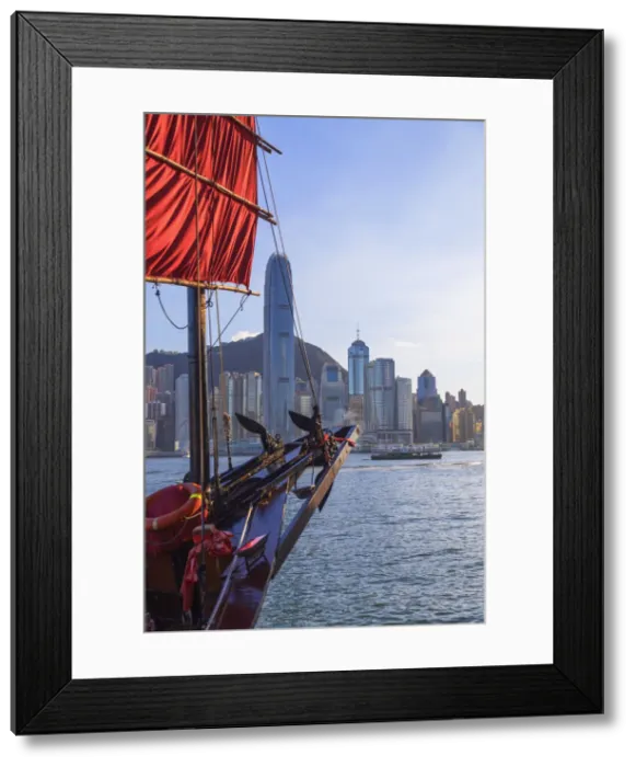Framed Print : Junk boat and skyline of Hong Kong Island, Hong Kong Framed Print : Junk boat and skyline of Hong Kong Island, Hong Kong