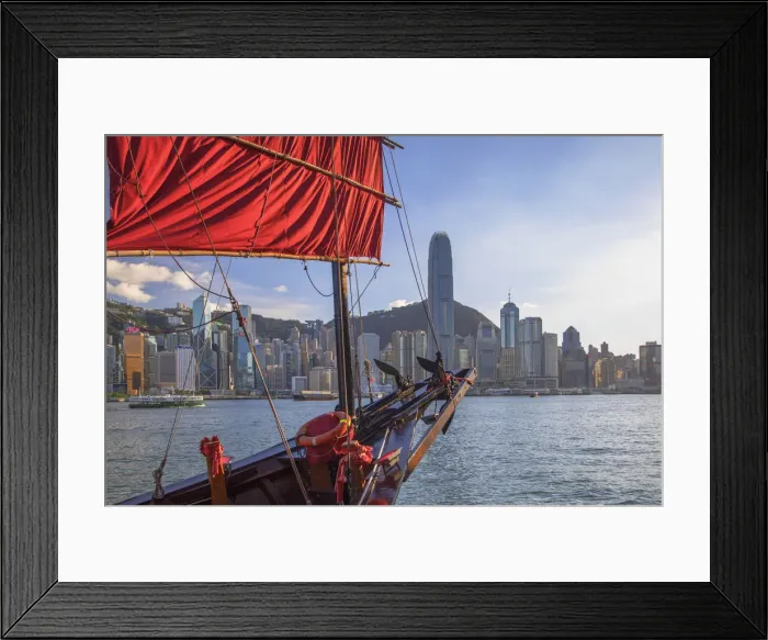 Framed Print : Junk boat and skyline of Hong Kong Island, Hong Kong Framed Print : Junk boat and skyline of Hong Kong Island, Hong Kong