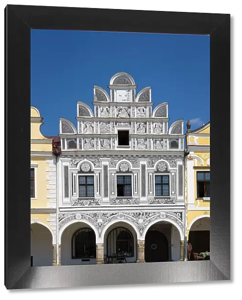 Iconic house with arcades and high gable at Zacharias of Hradec Square, UNESCO, Telc