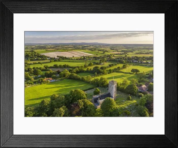 Framed Print : Aerial vista of the rural village of Morchard Bishop, Devon, England. Summer (July) 2020 Framed Print : Aerial vista of the rural village of Morchard Bishop, Devon, England. Summer (July) 2020