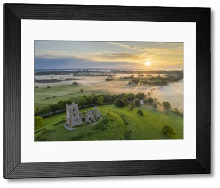Framed Print : The ruins of St Michaels Church at sunrise, Burrow Mump, Somerset, England Framed Print : The ruins of St Michaels Church at sunrise, Burrow Mump, Somerset, England