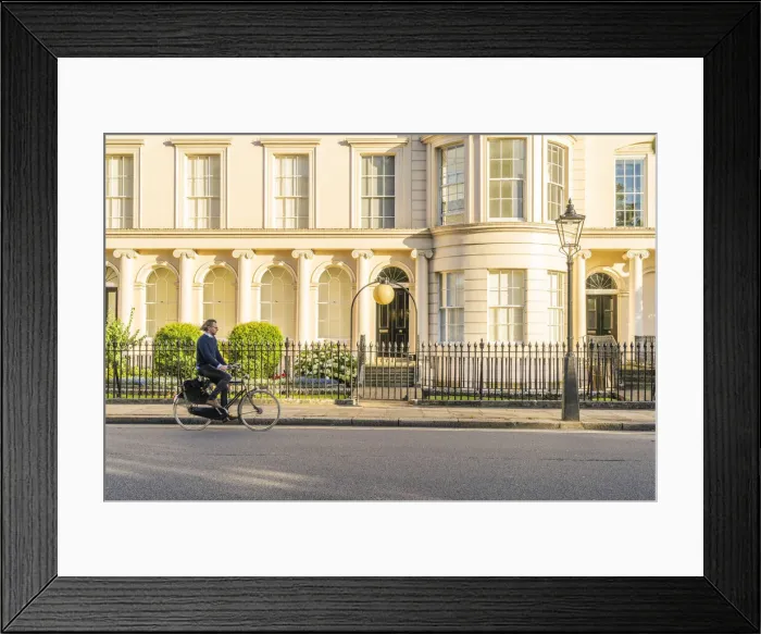Framed Print : A man cycling in Regents park, London, England, UK Framed Print : A man cycling in Regents park, London, England, UK