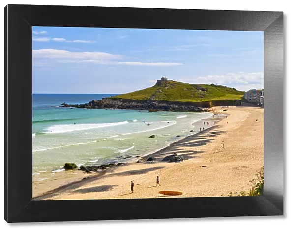 Porthmeor Beach with St Nicholas Chapel in the background, St Ives, Cornwall, England, UK
