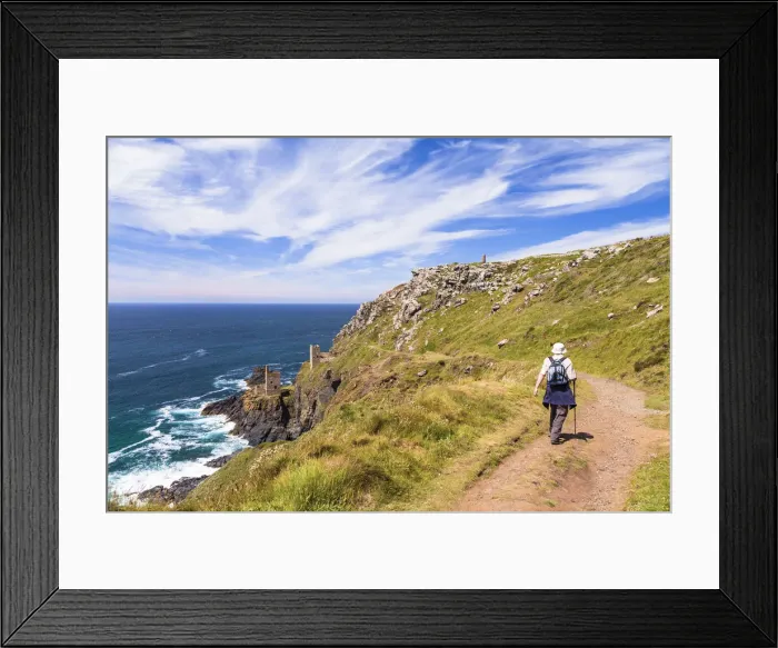 Framed Print : A man walking near Botallack Mine, Penzance, Cornwall, England, UK
