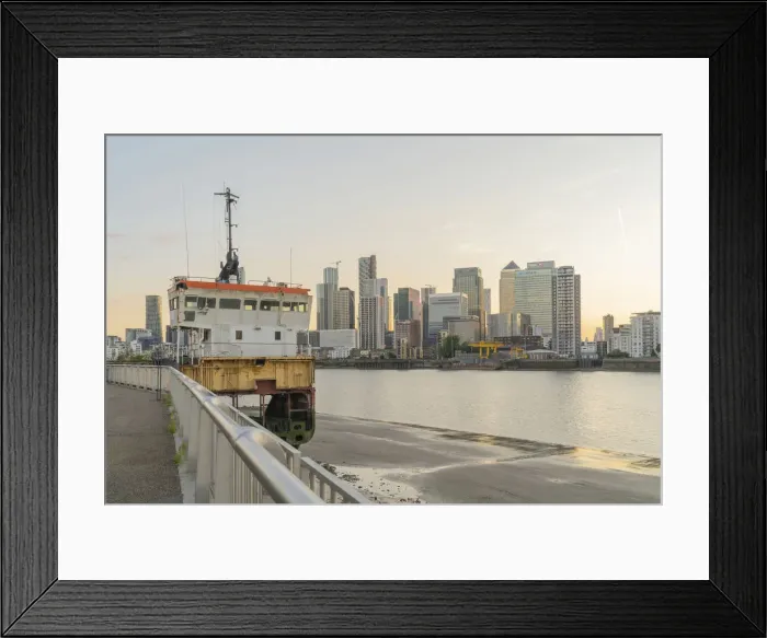 Framed Print : A view of Canary Wharf and A slice of reality sculpture by Richard Wilson Framed Print : A view of Canary Wharf and A slice of reality sculpture by Richard Wilson