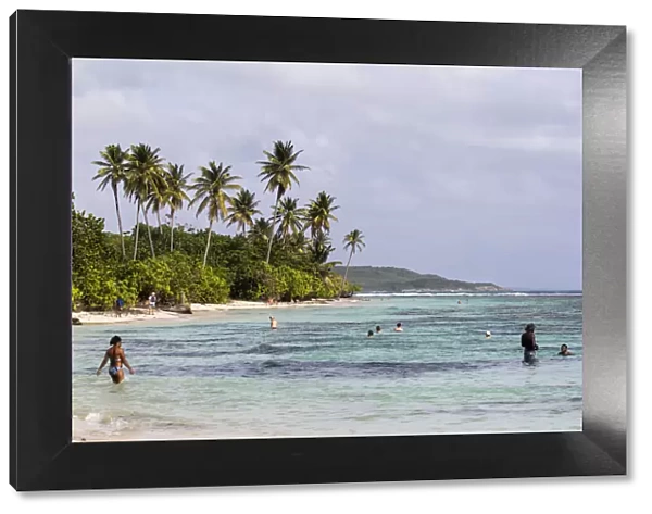 France, Guadeloupe, Sainte-Anne, People bathing at Bois Jolan beach