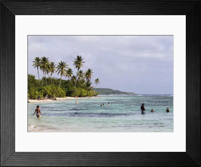 Framed Print : France, Guadeloupe, Sainte-Anne, People bathing at Bois Jolan beach Framed Print : France, Guadeloupe, Sainte-Anne, People bathing at Bois Jolan beach