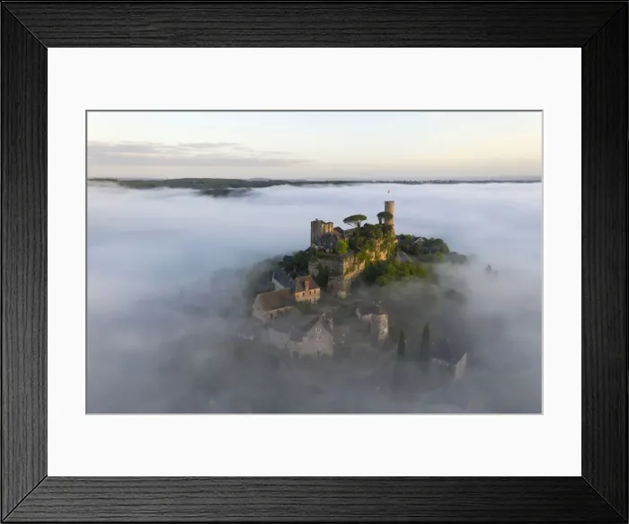 Framed Print : An aerial view of the hilltop village of Turenne at sunrise surrounded by mist, Correze Framed Print : An aerial view of the hilltop village of Turenne at sunrise surrounded by mist, Correze