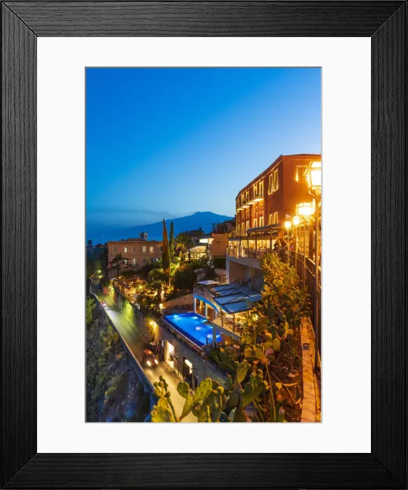 Framed Print : Taormina, Sicily. Luxury hotel by night with Etna volcano in the background Framed Print : Taormina, Sicily. Luxury hotel by night with Etna volcano in the background