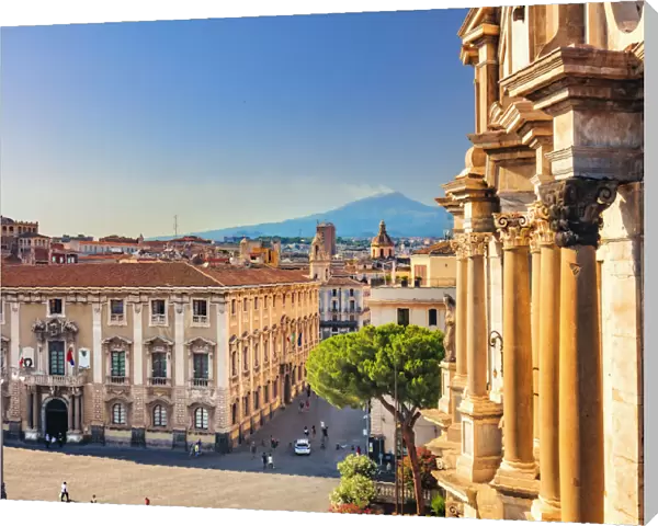 Catania, Sicily. Elevated view of the town with Etna volcano in the background