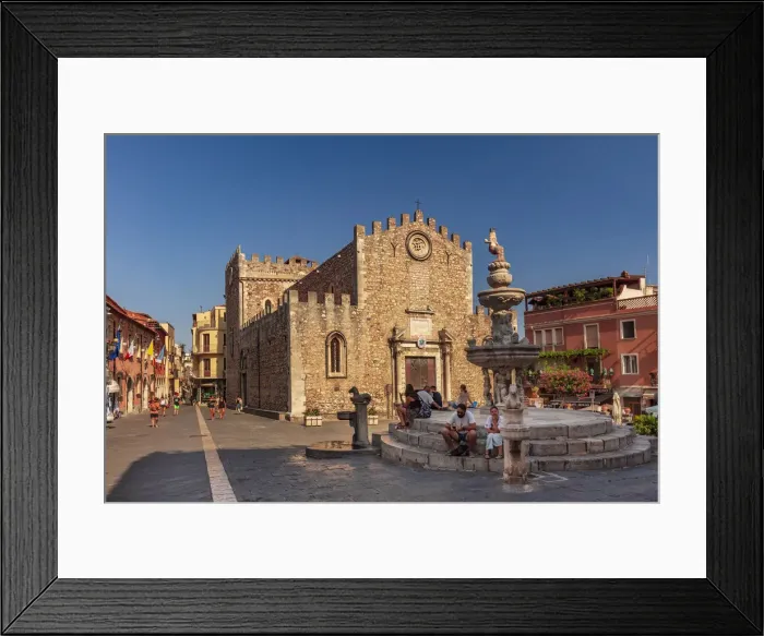 Framed Print : Taormina, Sicily. people sitting on the fountain near the Cathedral
